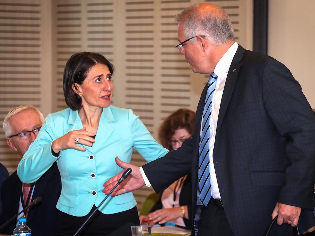 NSW Premier Gladys Berejiklian appeared to pull her hand away when Australian Prime Minister Scott Morrison went to shake it earlier this week. Picture: AAP Image/David Gray