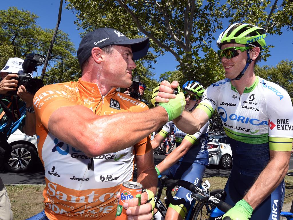 Gerrans shake hands with team-mate Michael Hepburn.