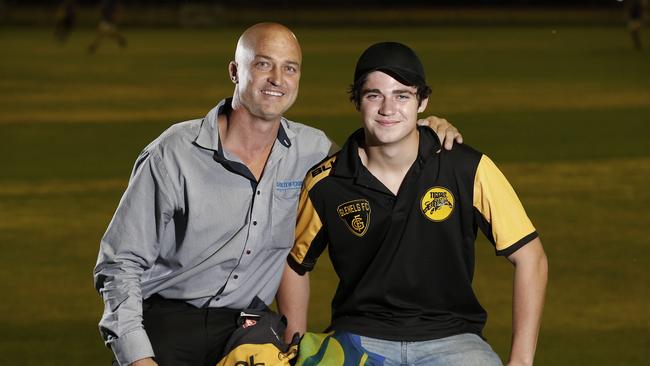 Josh Koster, pictured with father and Crows premiership player Kym Koster, has joined division two club SHOC for the remainder of the season. Picture Dean Martin