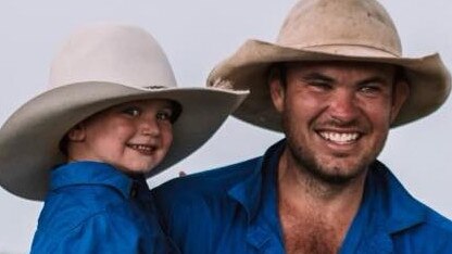 Chris Wilson with one of his sons. Picture: Outback Wrangler