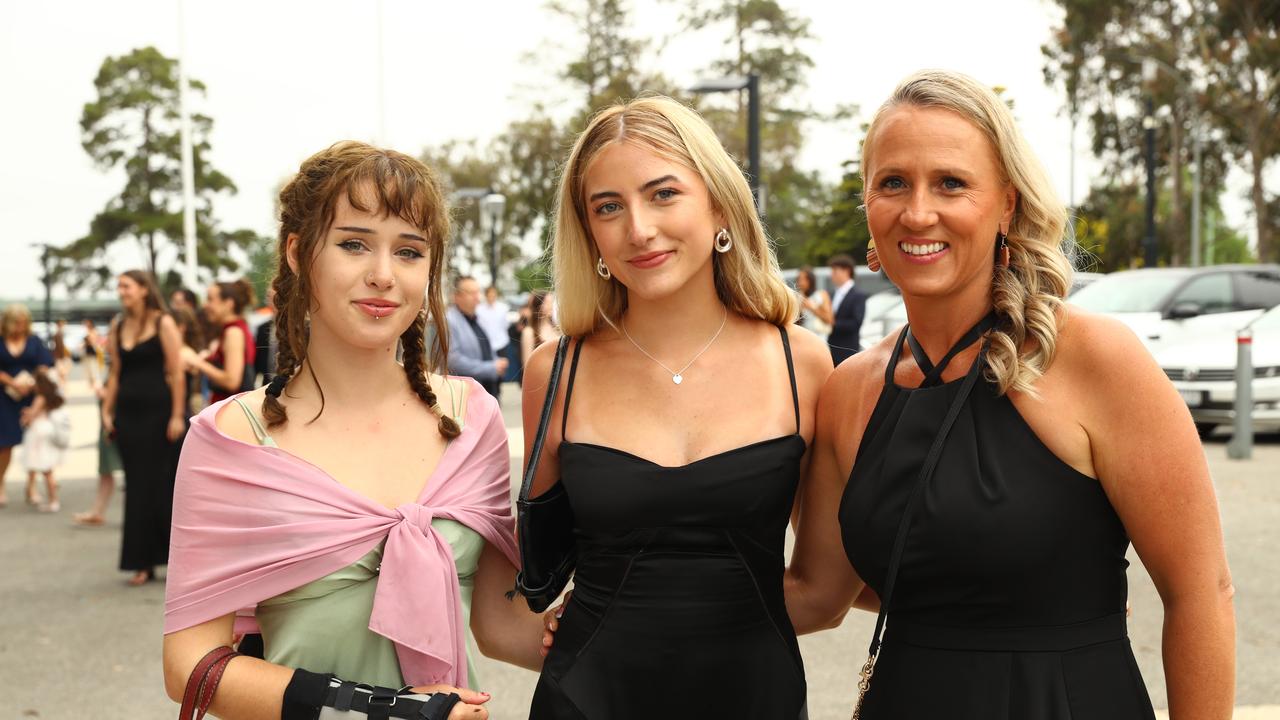 Valla Mitchell, graduate Emily White and her mum Sally at the Belmont High School year 12 graduation at GMHBA Stadium. Picture: Alison Wynd