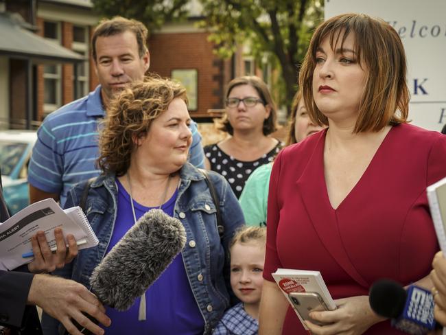 Local MP Jayne Stinson with parents outside the Black Forest Primary School. Picture: AAP/MIKE BURTON