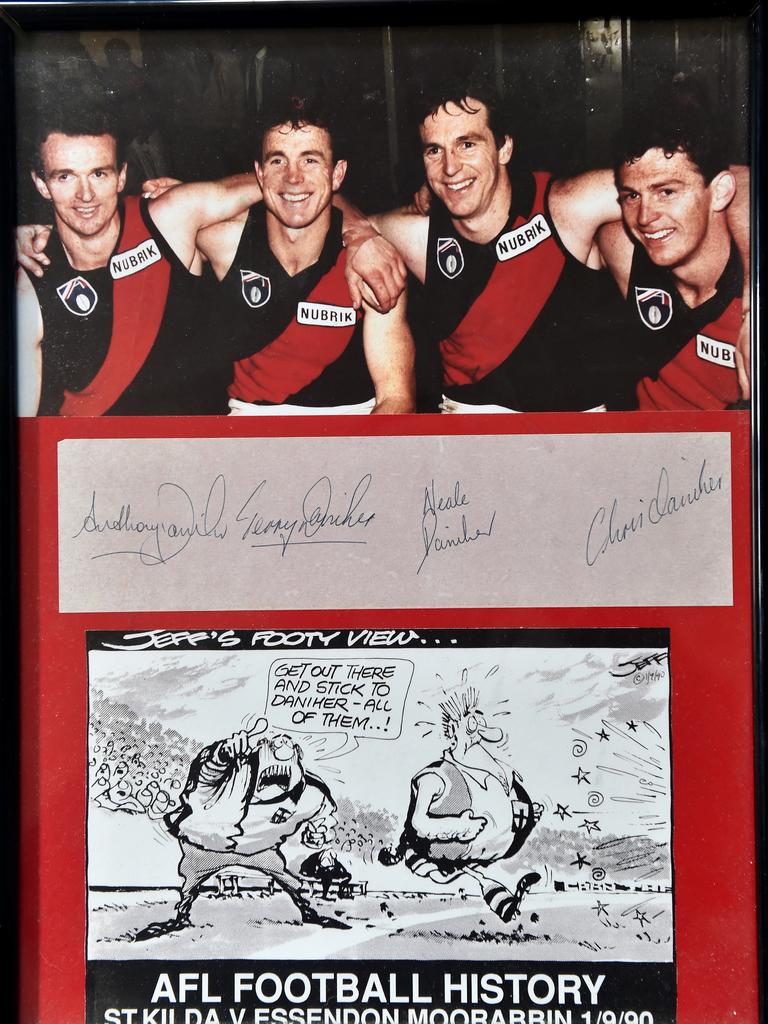 Memorabilia of the Daniher brothers’ history-making game against St Kilda in 1990 (Pictured are Anthony, Terry, Neale and Chris).