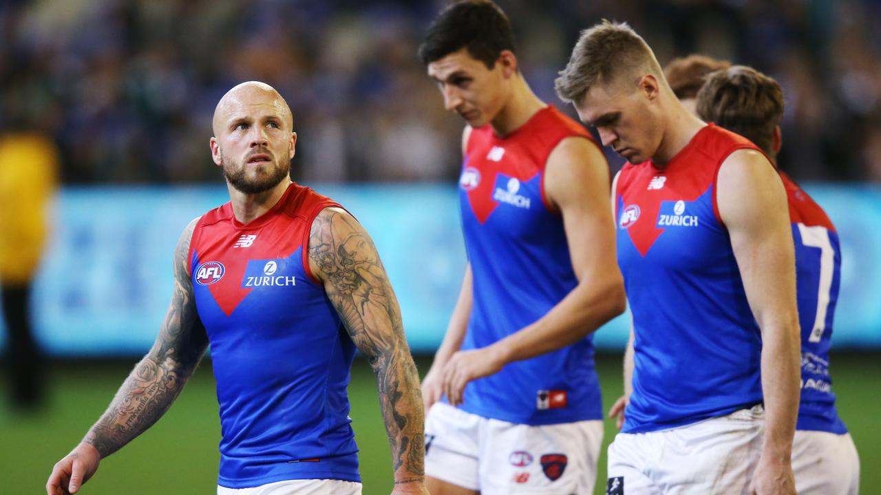 Nathan Jones walks off after Melbourne’s defeat to Collingwood. Photo: Michael Dodge/AFL Photos/Getty Images.