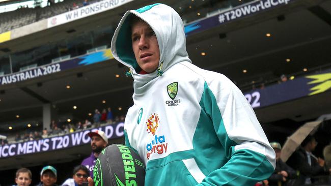 A rugged up Adam Zampa, who is set to return to the Aussie side.