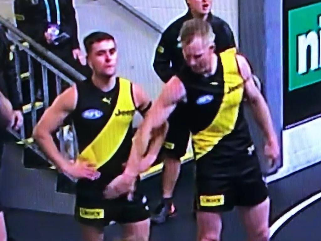 Jack Riewoldt appears to get handsy with teammate Jayden Short.