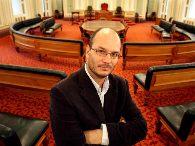 Nicholas Aroney, The University of Queensland reader in law, stands in the chamber that once housed the Queensland Upper house at Parliament House, Brisbane.