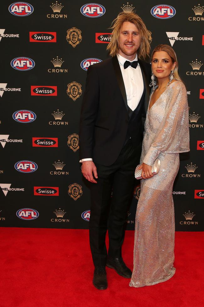 Essendon’s Dyson Heppell and Kate Turner. Picture: Michael Klein