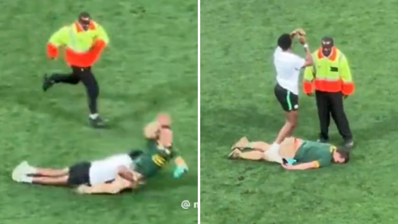 Pitch invader knocked out cold