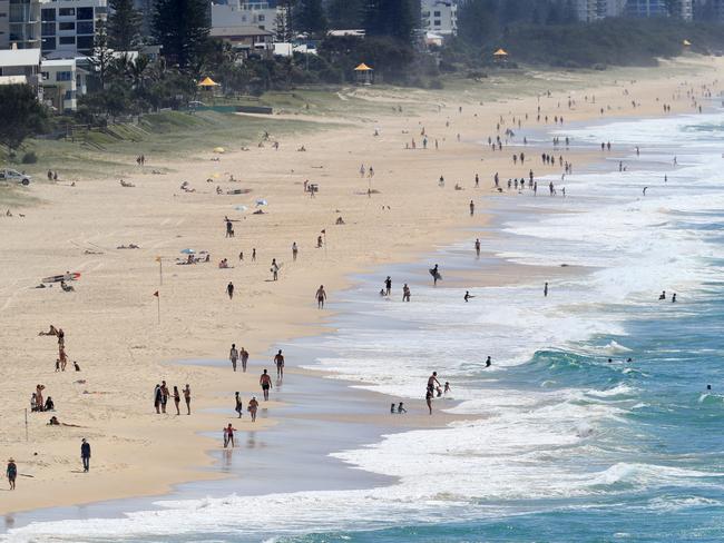 Gold Coast beaches were still packed yesterday despite tougher isolation rules coming into effect. Picture: Adam Head