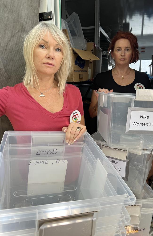 Jane Padden and Melanie Bosenberg from charity For Kids in Care with empty boxes after thieves stole items intended from children from a storage trailer in Oxenford. Picture: Keith Woods.