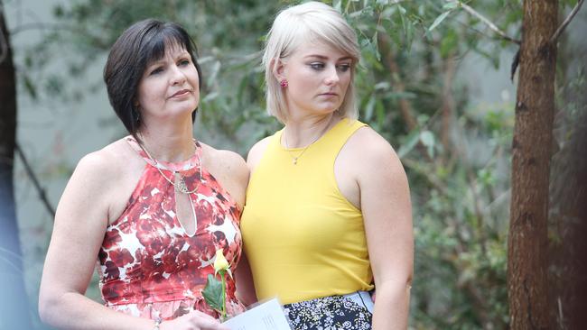 Sister and daughter of Cathy Lawton, who disapperaed on flight MH370, Jeanette Maguire and Amanda Lawton at the unveiling of a plaque and tree for the Lawtons, who disappeared in the MH370 mystery. To remind people the plane is still missing at Robelle Park, Springfield. Photo Ric Frearson