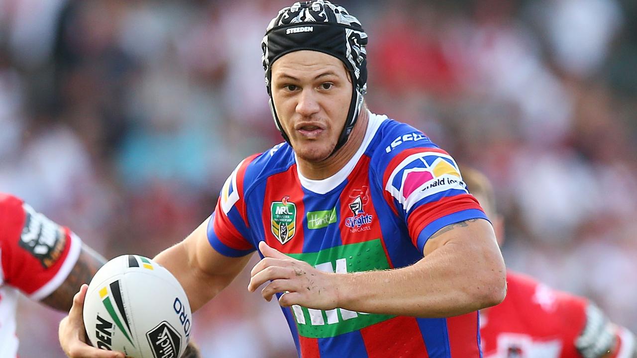 Kalyn Ponga of the Knights makes a line break.