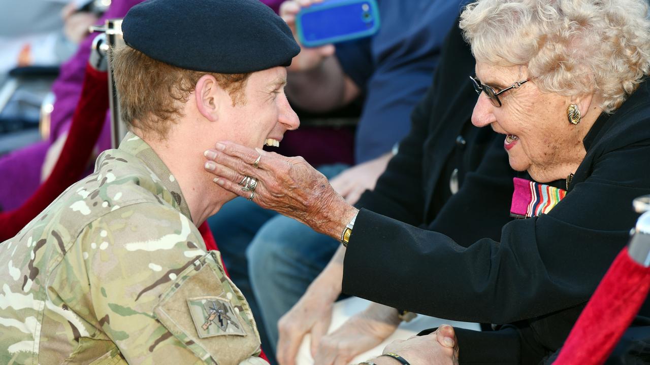 Prince Harry speaks with Daphne Dunne from Turramurra during a visit to the Sydney Opera House in Sydney on May 7, 2015.