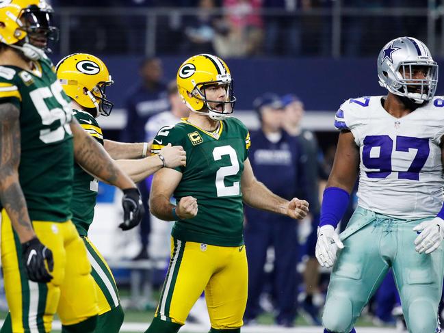 ARLINGTON, TX - JANUARY 15: Mason Crosby #2 of the Green Bay Packers reacts after kicking a field goal in the second half during the NFC Divisional Playoff Game against the Dallas Cowboys at AT&T Stadium on January 15, 2017 in Arlington, Texas. Joe Robbins/Getty Images/AFP == FOR NEWSPAPERS, INTERNET, TELCOS & TELEVISION USE ONLY ==