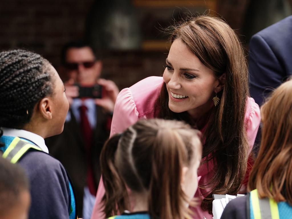 Kate was asked probing questions by some cute kids. Picture: Jordan Pettitt / POOL / AFP