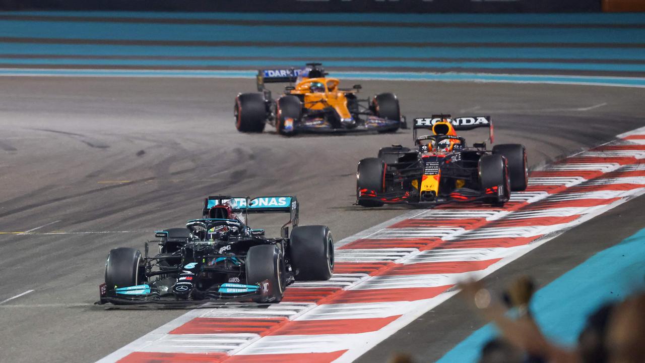 Max Verstappen overtook Lewis Hamilton to win the race and the title. Picture: AFP