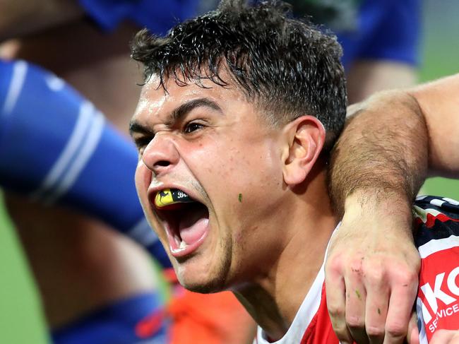 Roosters' Latrell Mitchell celebrates scoring a try during NRL match Sydney Roosters v Canterbury Bulldogs at the SCG. Picture. Phil Hillyard