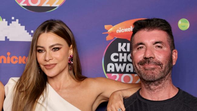 Sofi­a Vergara and Simon Cowell backstage at the Nickelodeon's Kids' Choice Awards.