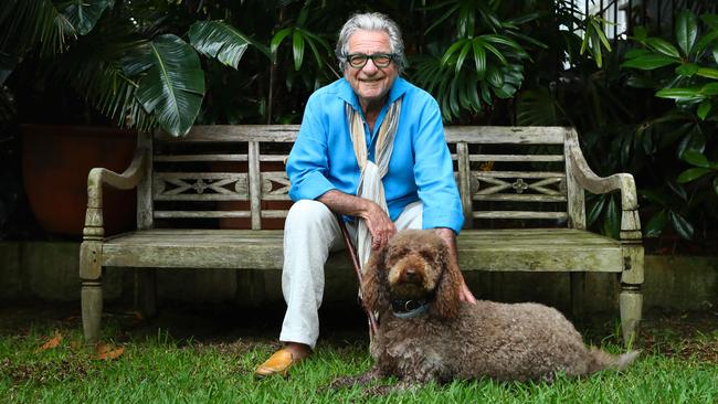 Peter Weiss with Buzo the labradoodle at home yesterday. Picture: Hollie Adams