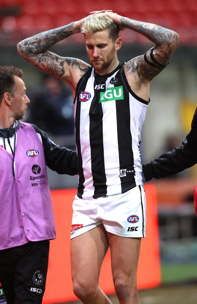 Collingwood’s Jeremy Howe after injuring his knee. Picture: Phil Hillyard