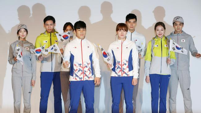 South Korean Olympic athletes and models show the South Korean Olympic team uniforms.