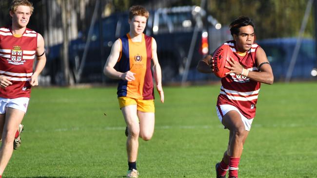 Prince Alfred College’s Isaiah Dudley with the ball against St Michael’s college in a Messenger Shield college football clash at PAC last month. Picture: AAP/Keryn Stevens