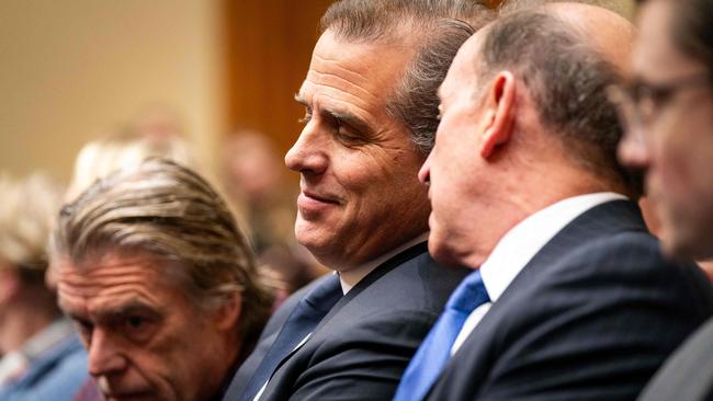 Hunter Biden, flanked by Kevin Morris, left, and Abbe Lowell, right, attend a House Oversight Committee meeting. Picture: Getty Images via AFP.