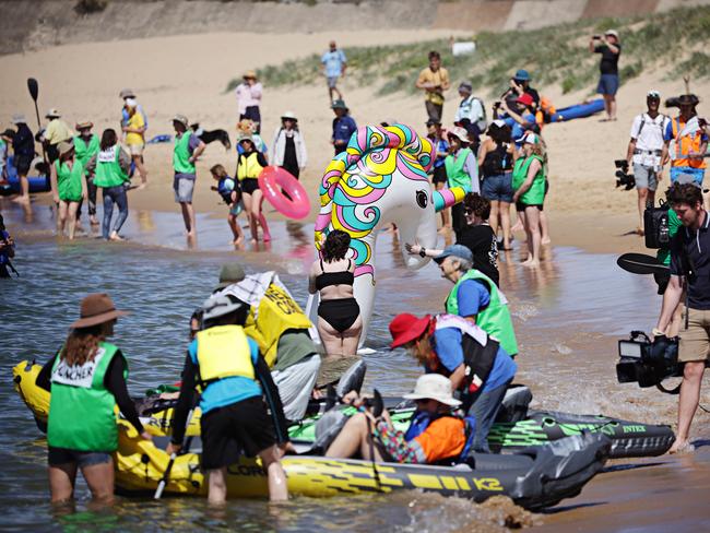 Protesters take to the water at the Newcastle Port protest at Horseshoe Beach. Picture: Adam Yip