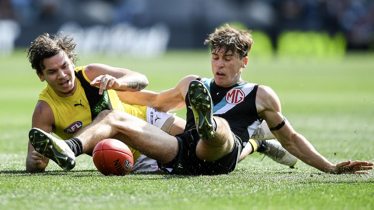 ADELAIDE, AUSTRALIA - AUGUST 27: Daniel Rioli of the Tigers competes with Connor Rozee of Port Adelaide during the round 24 AFL match between Port Adelaide Power and Richmond Tigers at Adelaide Oval, on August 27, 2023, in Adelaide, Australia. (Photo by Mark Brake/Getty Images)