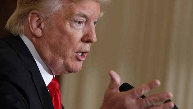 Donald Trump has defended his temporary ban on travellers from seven predominantly Muslim nations entering the US.