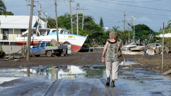 News 1.2.2013, Courier Mail Bundaberg, A trawler sits high &amp; dry in Quay st Bundaberg after the flood. Photo Paul Beutel