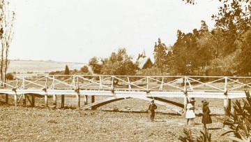 Footbridge over the dry artificial lake at Flemington House circa 1900. Picture: Arthur Fox, State Library of Victoria