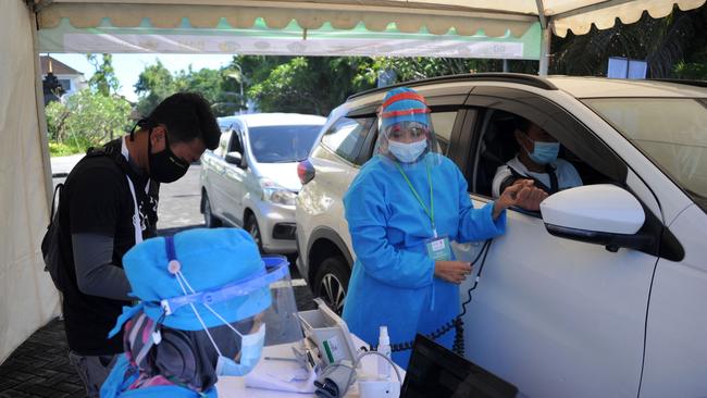 Medics prepare to administer the coronavirus vaccine at Bali’s Nusa Dua. Picture: AFP