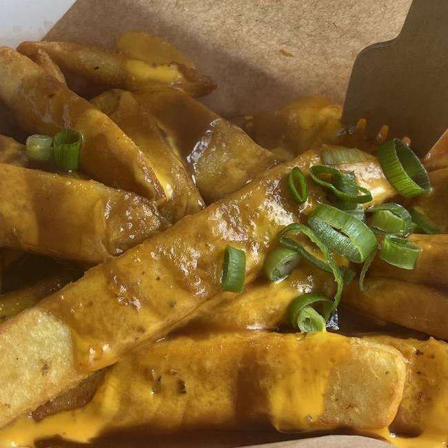 Footscray's 8bit. serves up these delicious Chips and Gravy for $10 which comes with beer battered fries (or gems), cheese sauce, beef gravy, and spring onions. Picture: Nilsson Jones