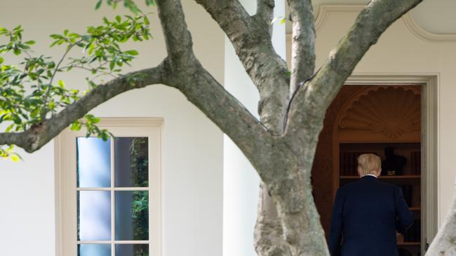 Donald Trump enters the Oval Office last week. Picture: AFP