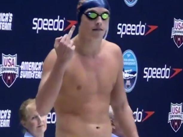 Why is this swimmer giving the finger?
