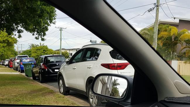 Shane Christall took this photo – highlighting how hard it can be to get out his driveway to due the number of people parking in streets surrounding the hospital.