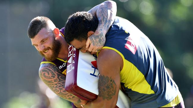 McGuire won’t hold back against his Brisbane teammates. (AAP Image/Darren England)