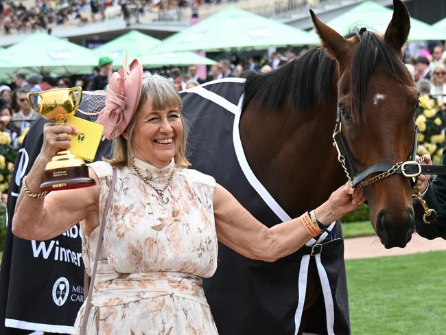 MELBOURNE, AUSTRALIA - NOVEMBER 09:  Melbourne Cup winning Co trainers Sheila Laxon and John Symons, jockey Robbie Dolan and connections pose with Knight's Choice during Champion Stakes Day at Flemington Racecourse on November 09, 2024 in Melbourne, Australia. (Photo by Vince Caligiuri/Getty Images)