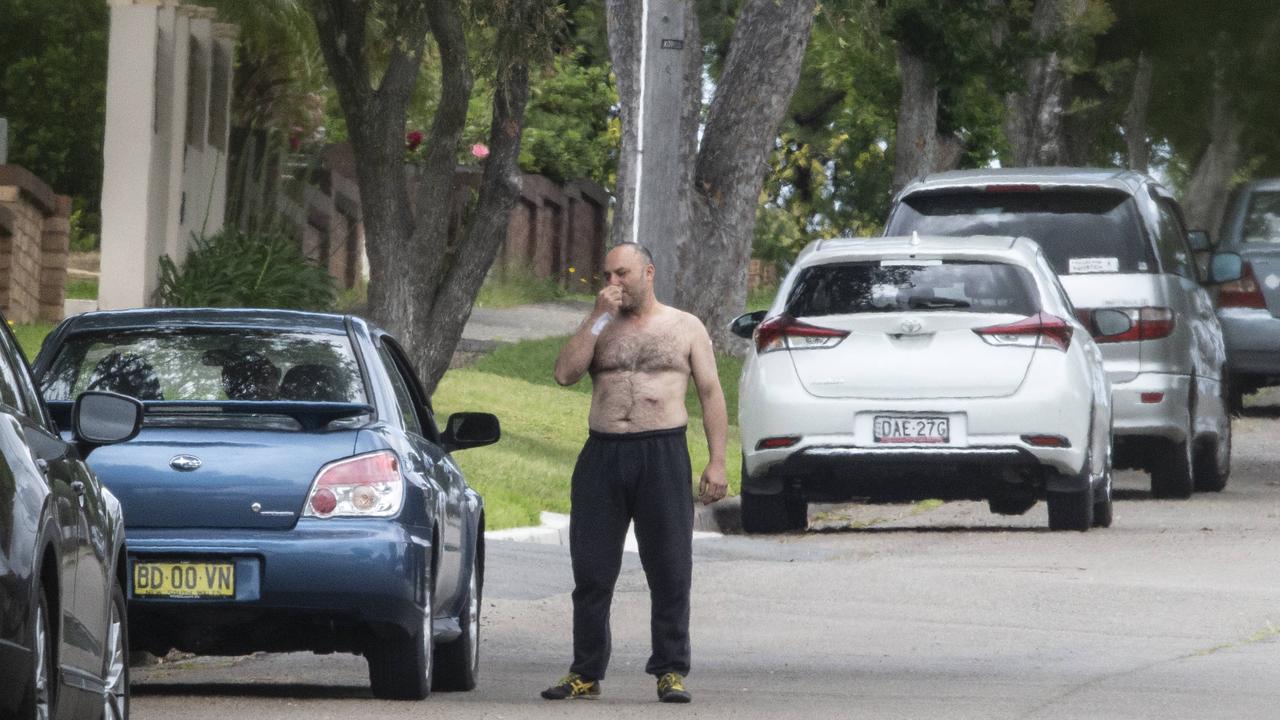 A stab wound on his torso visible, Nick Gilio in his street today after being released from hospital with a stab wound. Picture: Jenny Evans