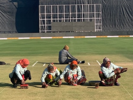 The locals help prepare the wicket at Rajkot, India ahead of Friday’s second ODI.