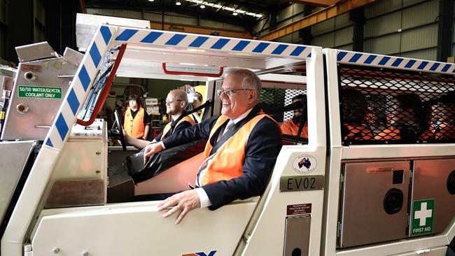 Scott Morrison visits Ampcontrol in Tomago, NSW, on Monday. Picture: Adam Taylor