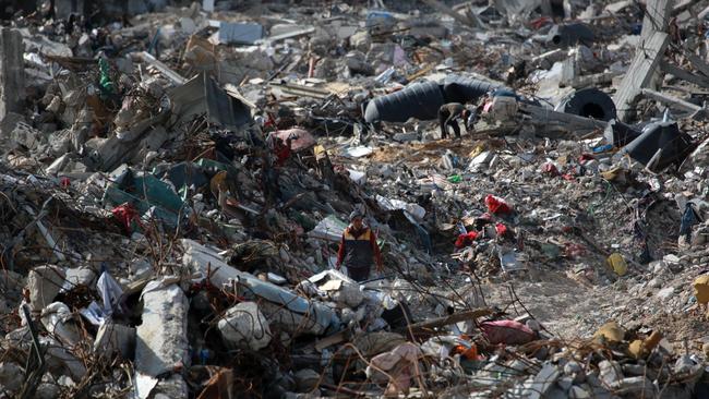 A displaced Palestinian man walks amid the devastation upon his return to central Rafah in the southern Gaza Strip after a ceasefire between Israel and Hamas took effect. Picture: AFP