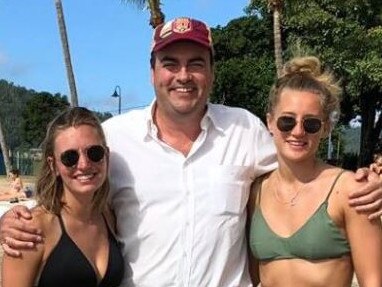 A Queensland MP has been slammed by the state's deputy premier after he posted a video with bikini-clad foreign tourists on World Bikini Day.