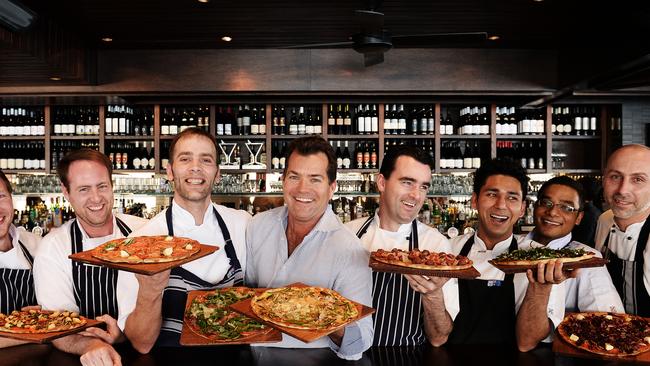 Hugos managing director David Evans and his team with the award-winning pizzas. Picture: Braden Fastier.