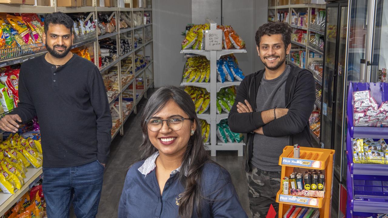 Owner of Quick and Easy Indian Grocery Store and Tobacconists Sejal Patel with husband Jiten Shah (left) and store attendant Milan Patel. Picture: Nev Madsen