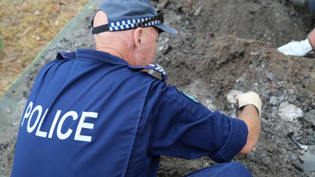 Police search a property in Blaxlands Ridge.