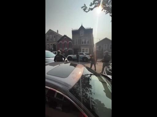 Neighbors Stand Up to ICE Officers Arresting Two Men in Chicago