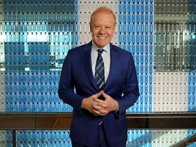 28/11/2018: Anthony Pratt in front of a wall of plastic bottles at the Visy office in Melbourne. Stuart McEvoy/The Australian.